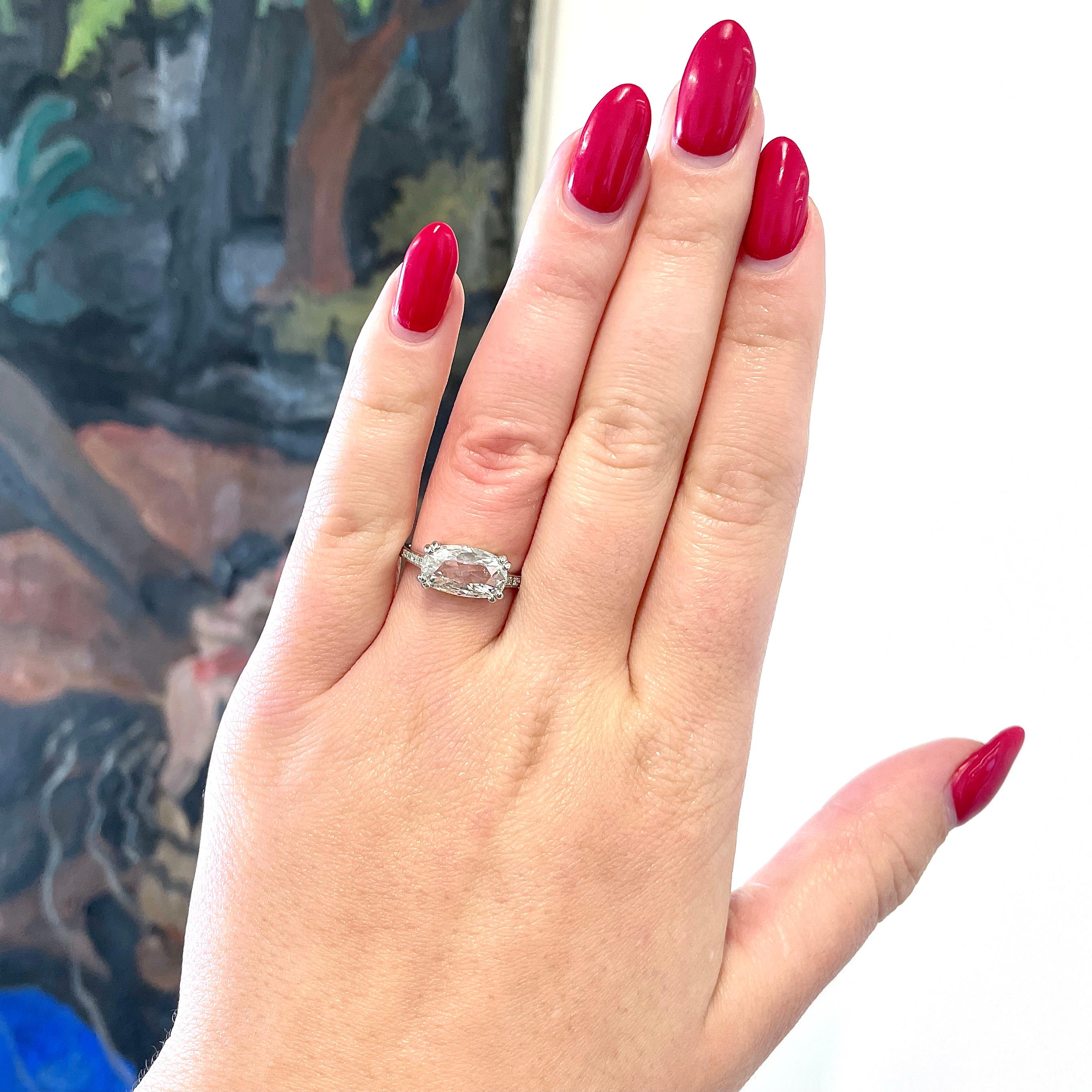Do you like to stay on top of all fashion trends? Consider this GIA 2.03 carat  Elongated Cushion Cut Diamond Platinum East West Ring.  Be the first in your crowd to have this different and one of a kind jaw dropping ring.  

The center stone is a
