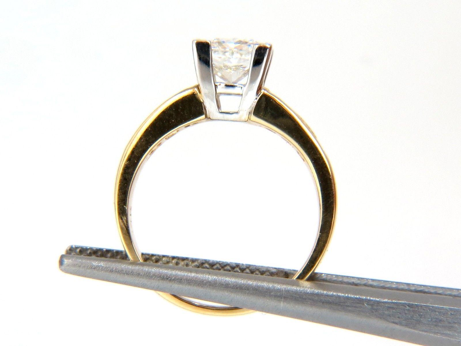 GIA Certified:  1.03Ct Natural Princess Cut diamonds ring.

Report # 2145776269

Stating: H-color Si-1 clarity.

Excellent Polish 

Very Good Symmetry.  



1.00ct. Side princess cut diamonds:

H-color Vs-2 clarity.



14kt. yellow gold 

3.6