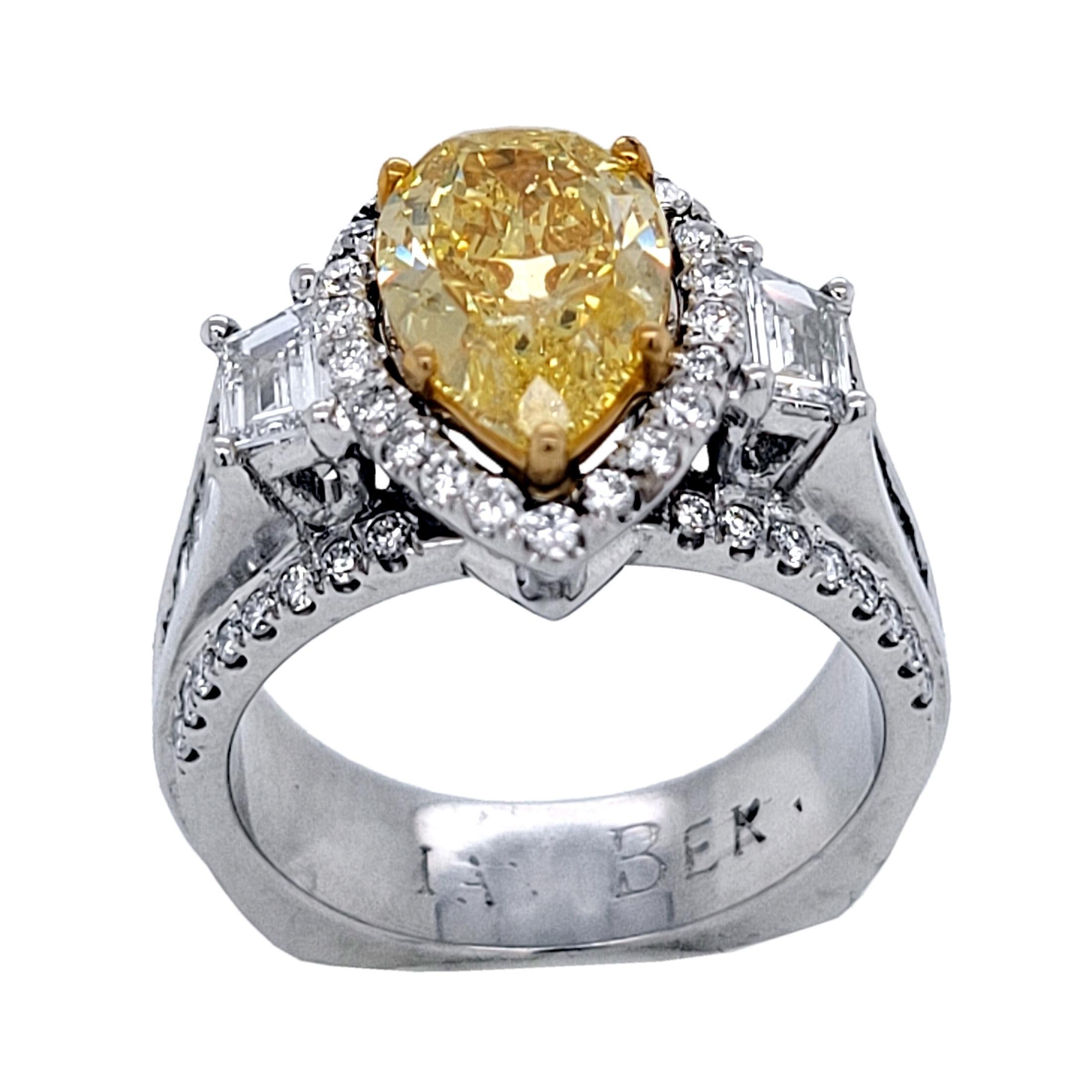 Contemporary GIA 2.03 Ct Fancy Intense Yellow Pear Shaped Platinum Engagement Ring w. 2 Traps For Sale