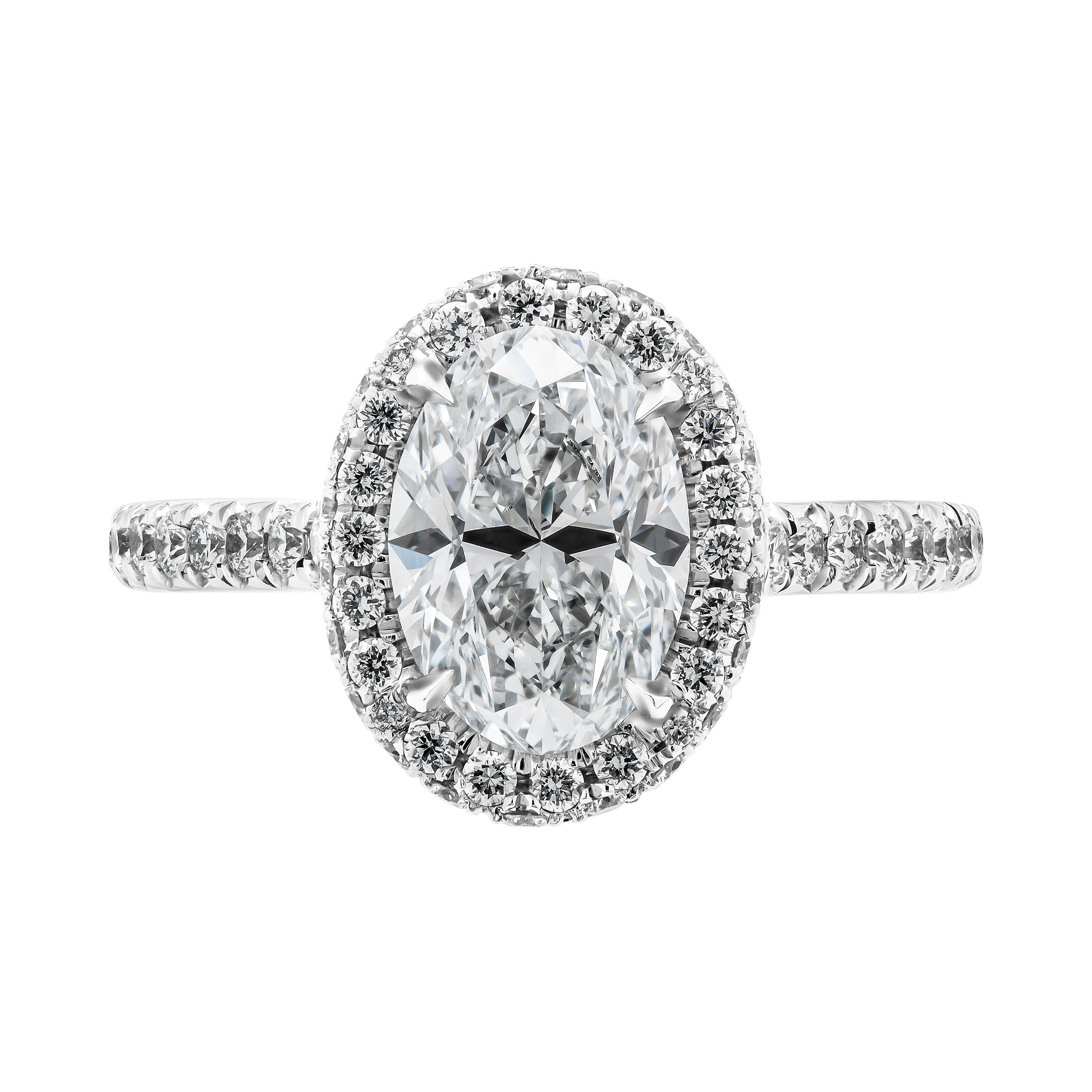 Mounted in handmade custom design setting featuring 14K White Gold, white full cut diamonds are encrusted all over the fancy gallery, diamond stems, double edge halo around center stone, diamonds on the shank - complimenting the beauty and the shape