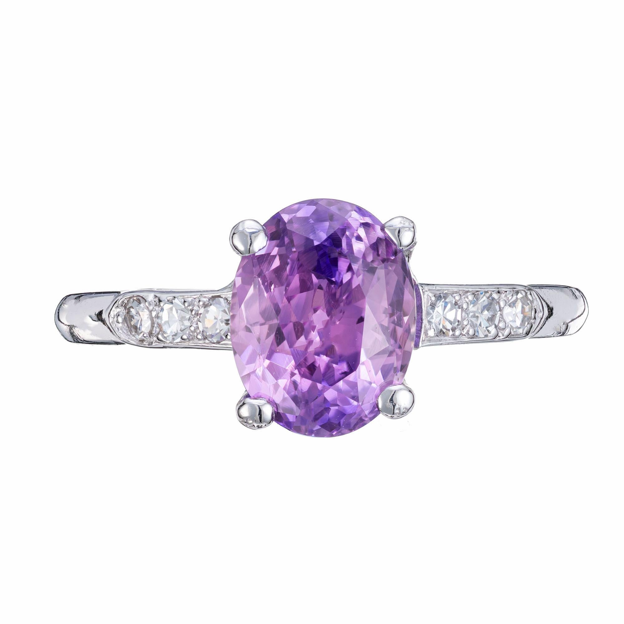 1930's late Art Deco sapphire and diamond engagement ring. GIA certified 2.05ct rich purple oval center sapphire with 6 transitional cut accent diamonds in platinum setting. Natural color change Sapphire, no heat or enhancements. The color changes