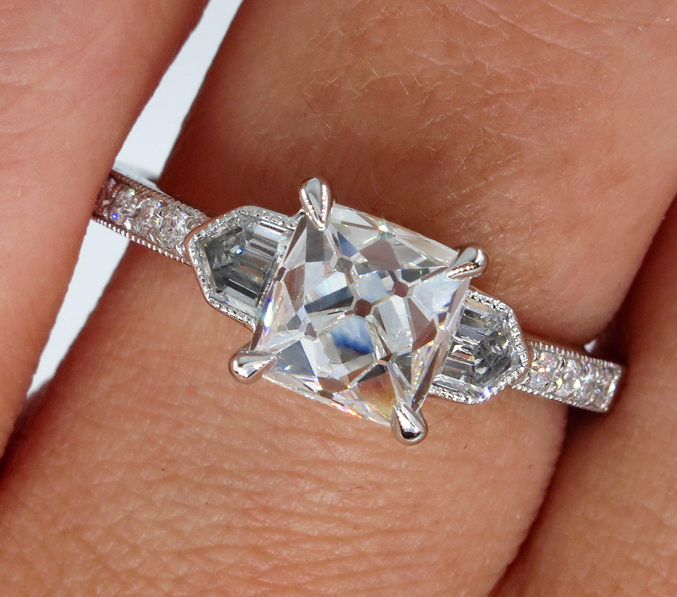 Vintage 2.07ctw French Cut GIA H-VS1 Diamond Art Deco Inspired Trilogy Engagement Platinum Ring.

This one-of-a-kind Art Deco style 3 Stone Engagement ring centers a pretty mesmerizing diamond - GIA certified 1.60 carat antique French cut diamond,
J