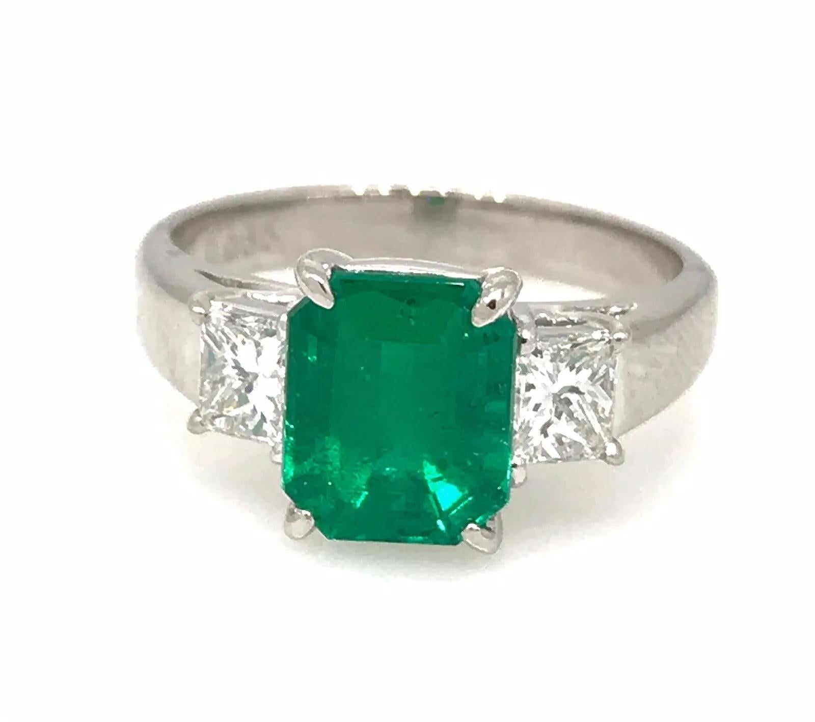 Women's GIA 2.09 carat Colombian Emerald Three-stone Ring with Diamonds in Platinum For Sale