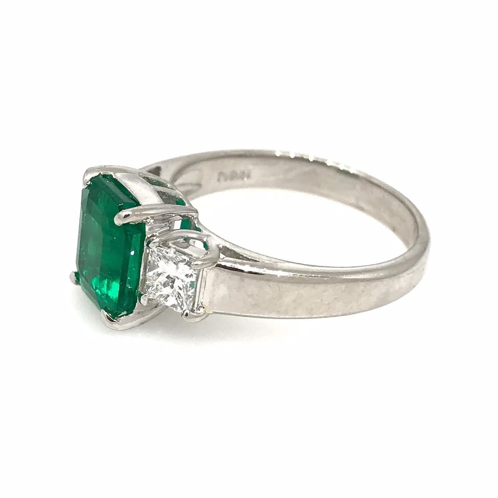 GIA 2.09 carat Colombian Emerald Three-stone Ring with Diamonds in Platinum For Sale 1