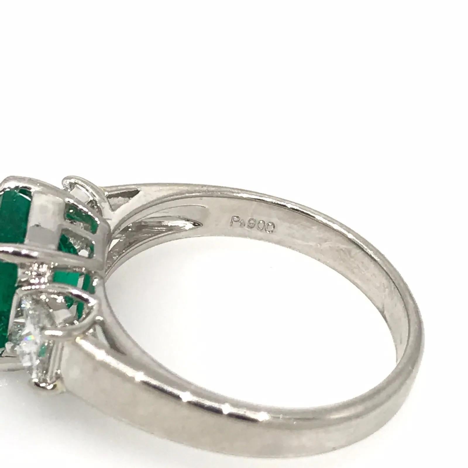 GIA 2.09 carat Colombian Emerald Three-stone Ring with Diamonds in Platinum For Sale 2