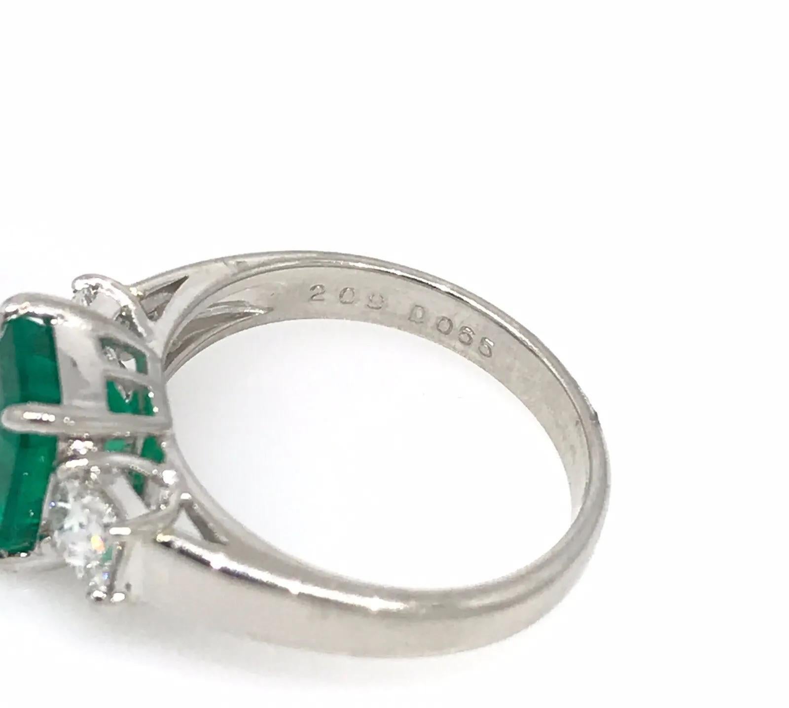 GIA 2.09 carat Colombian Emerald Three-stone Ring with Diamonds in Platinum For Sale 3