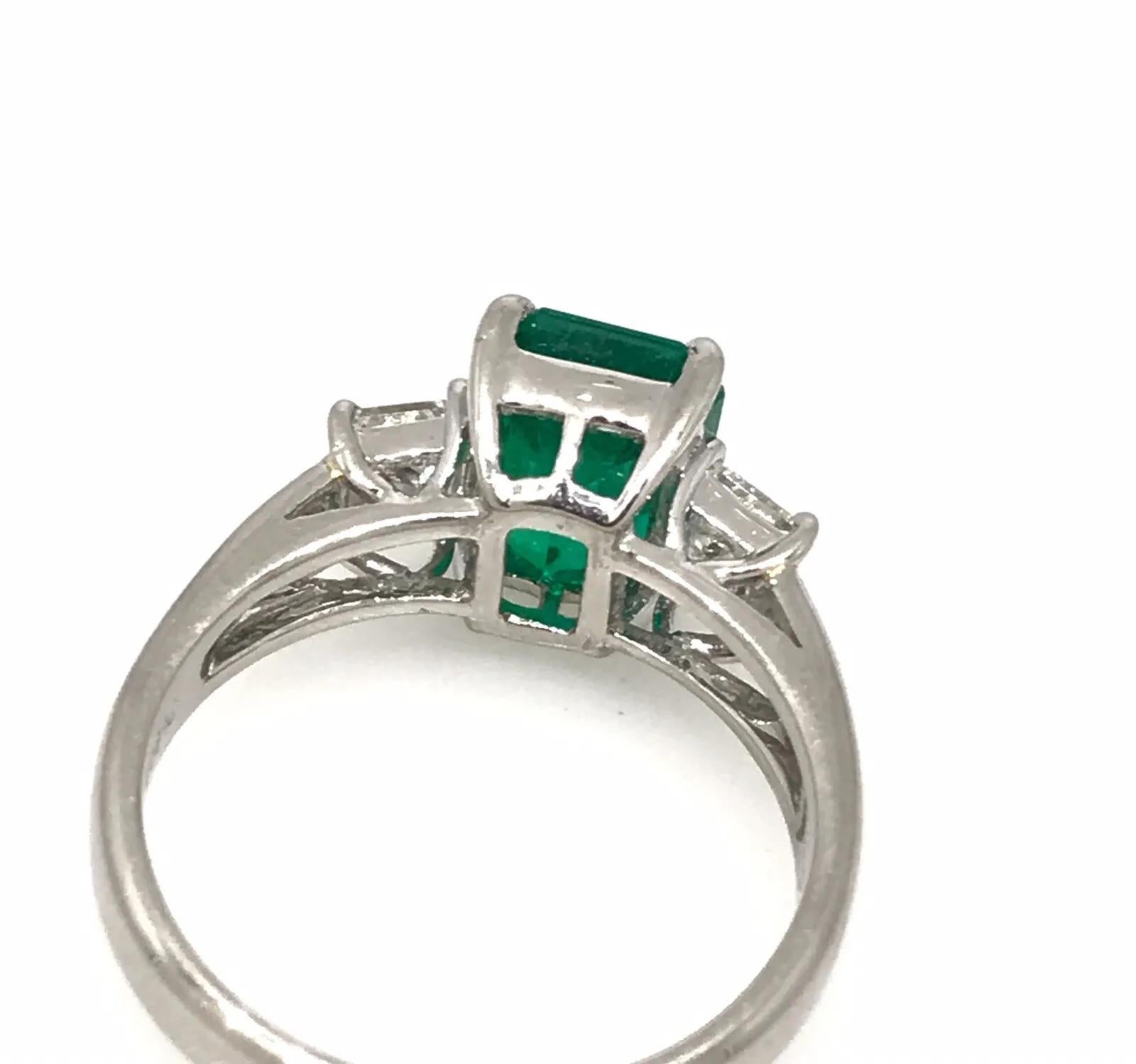 GIA 2.09 carat Colombian Emerald Three-stone Ring with Diamonds in Platinum For Sale 4