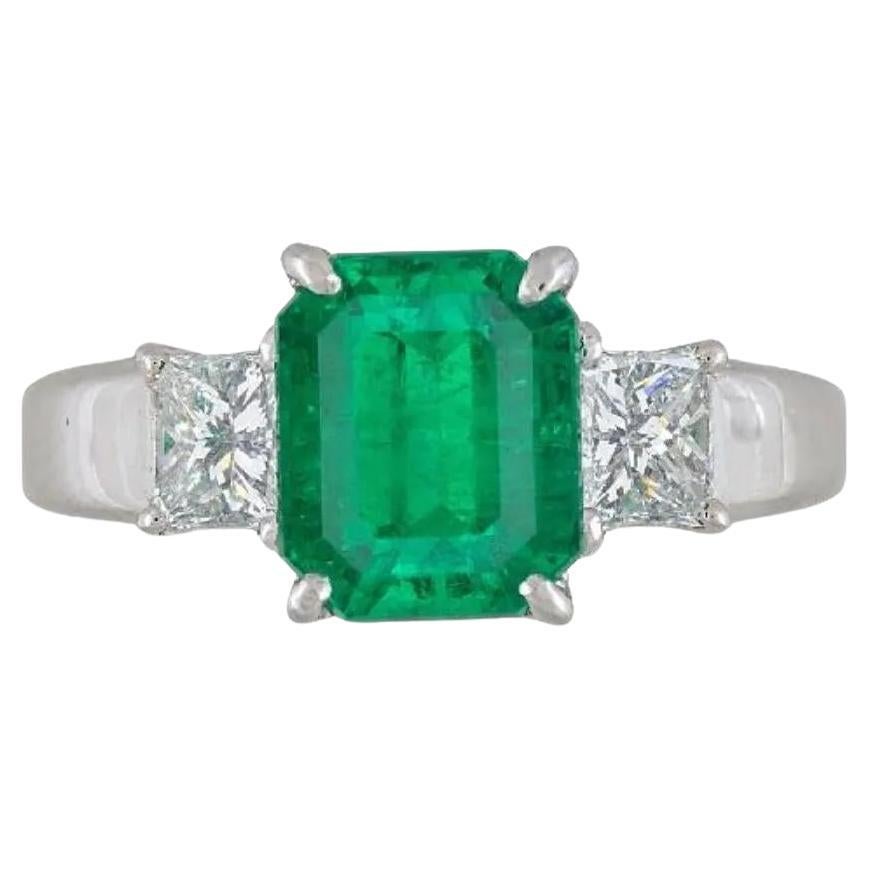 GIA 2.09 carat Colombian Emerald Three-stone Ring with Diamonds in Platinum For Sale