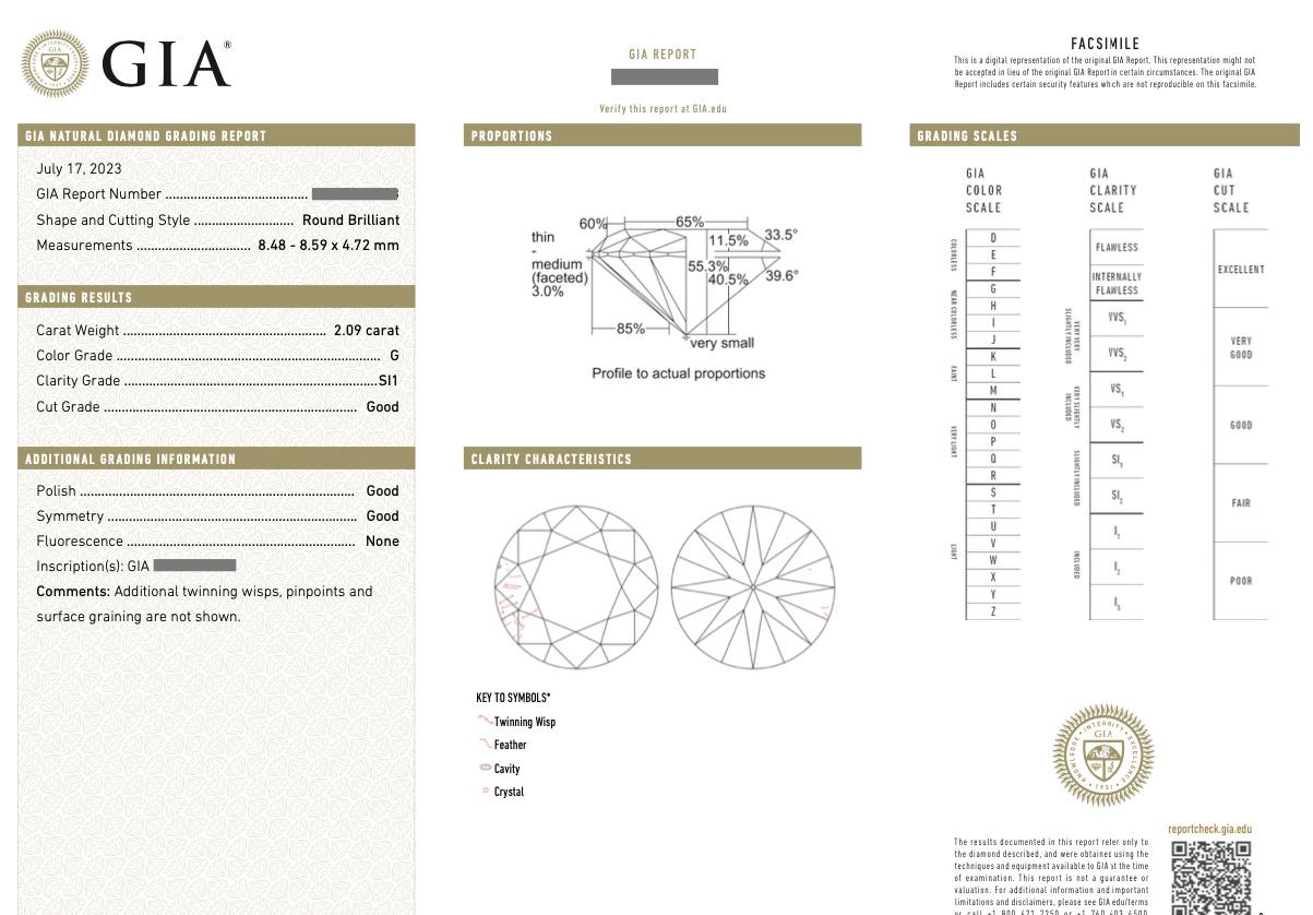 GIA Certified 2.09 Carat Round Diamond Solitaire Engagement Ring in 18k Yellow Gold

Round Brilliant Diamond Solitaire Ring features a Round Brilliant cut Diamond 4-Prong set in 18k Yellow Gold.

Diamond weight is 2.09 carats and is GIA