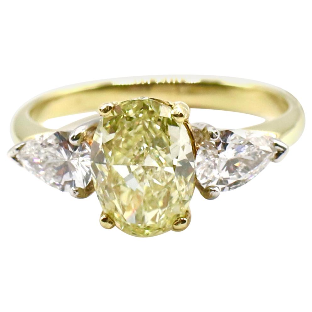 GIA 2.10 Carat Oval Natural Fancy Light Yellow VS1 Diamond Engagement Ring