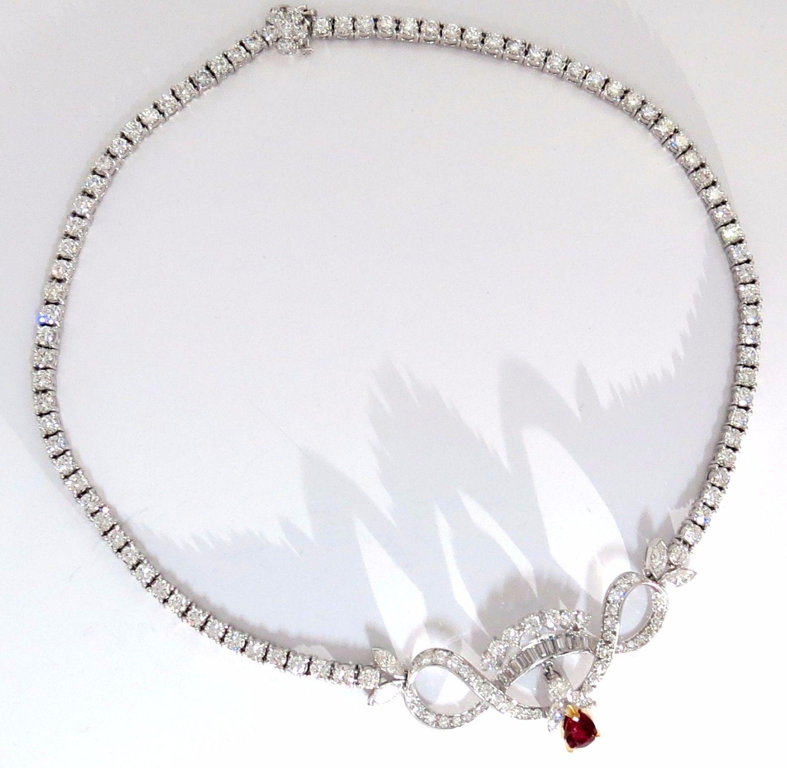 GIA 1.19ct. Natural Ruby & 20.00ct diamonds necklace.

The Vintage Elegance.

GIA #1152940016

Pear Shape, Full cut

clean clarity and transparent. 

6.75 X 5.18 X 4.05mm.

The classic Vivid Red.



20.00 Natural diamonds.

Baguettes, Marquise &