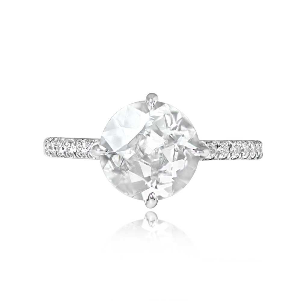 This exquisite diamond solitaire engagement ring showcases a vibrant old European cut diamond securely set in prongs. The diamond is GIA-certified, boasting impressive specifications of 2.11 carats, D color, and VS2 clarity. The elegant platinum