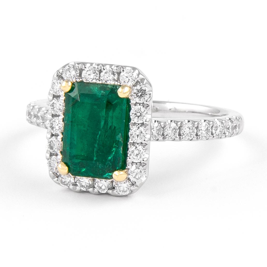 Classic emerald and diamond halo ring, GIA certified. 
2.16 carats total gemstone weight.
1.64 carat emerald cut emerald, F2, GIA certified. Complimented by 32 round brilliant diamonds, 0.52 carats, F/G color and VS clarity. 18k white and yellow