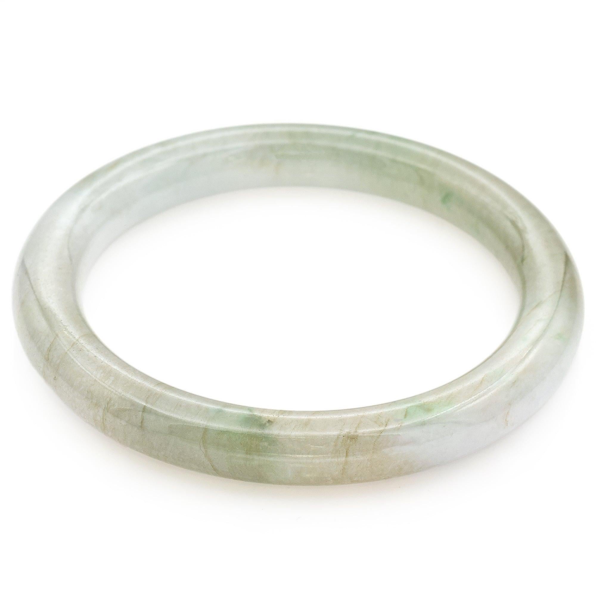 Poids : 219 carats
Dimensions : 73,85x8,94 mm
Forme:Bracelet
Transparence : Translucide
Couleur:Vert tacheté Gris clair
Description de l'article:Une sculpture en vrac
Espèce:Jadeite Jade
Type:A
Taille du bracelet : 7 pouces

Numéro d'article :