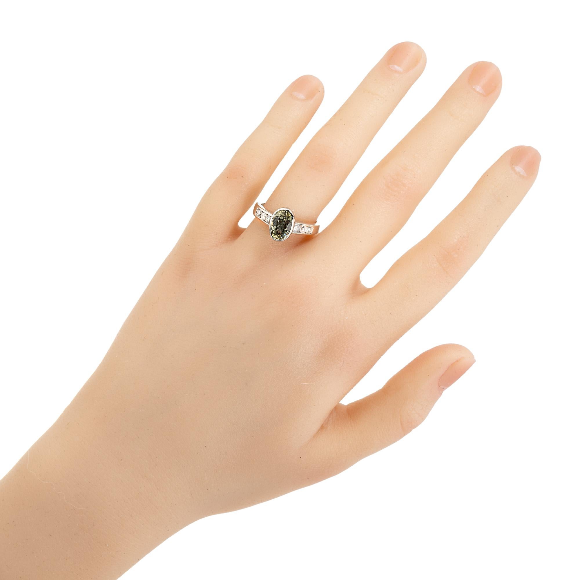 GIA 2.20 Carat Oval Green Yellow Sapphire Diamond Platinum Engagement Ring In Good Condition For Sale In Stamford, CT