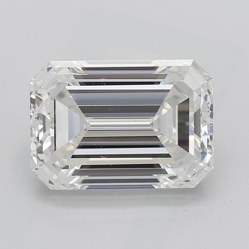 Handcrafted in New York, this stunning diamond ring features a captivating, GIA-certified center stone of emerald diamonds weighing 2.20 and graded H and VS1. The brilliance and fire of the center stone are beautifully complemented by a row of
