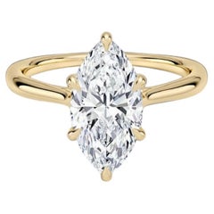GIA 2.25 Carats F/VS1 Marquise Diamond Hidden Halo Engagement Ring In 18K Gold