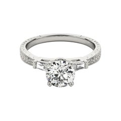 GIA 2.25ct Round Engraved Three-Stone Baguette  Bague en diamant