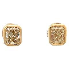 GIA 2.26 Carats Total Weight Radiant Cut Yellow Diamond Stud Earrings