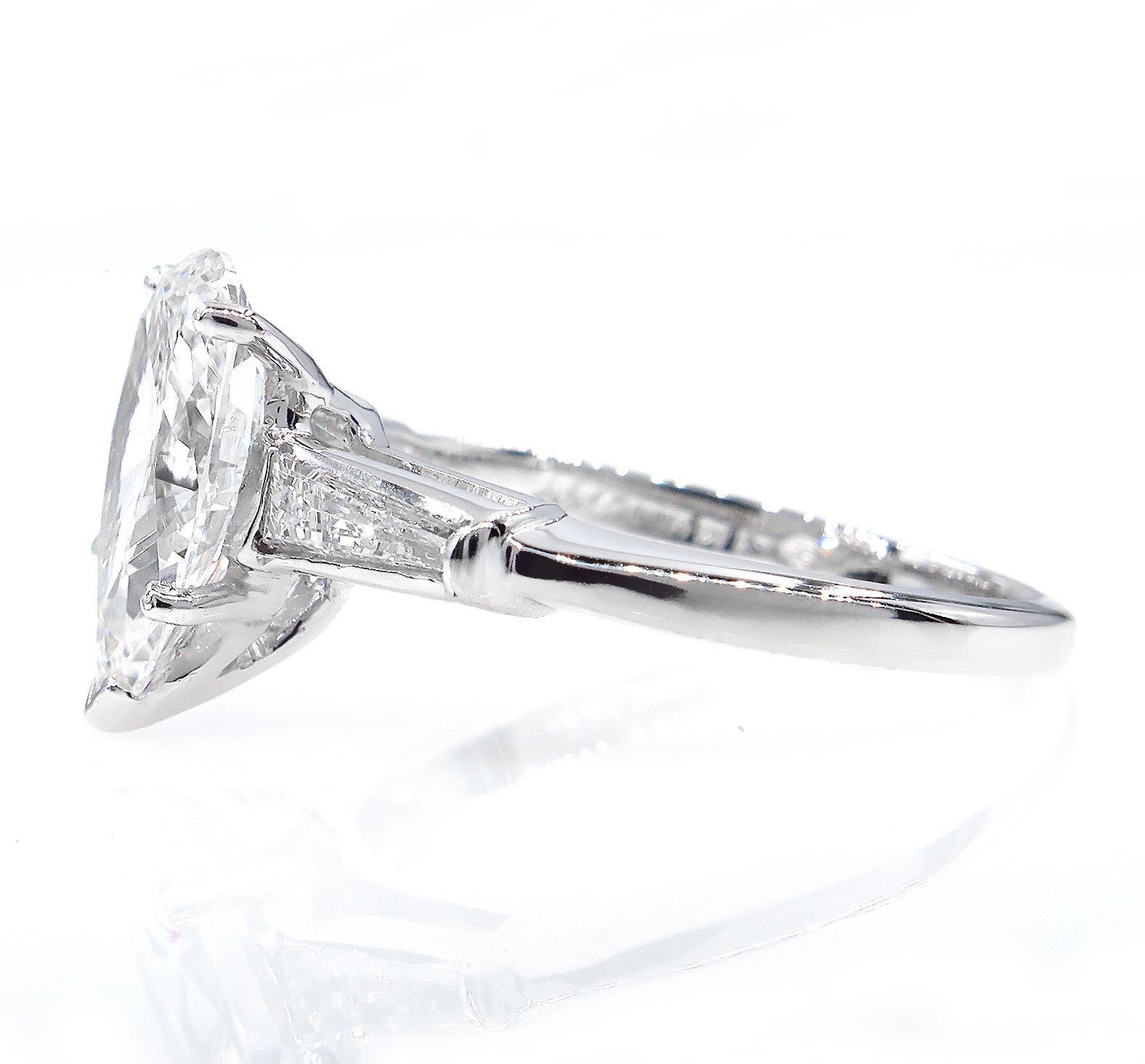 Women's GIA 2.38 Carat Pear Shaped and Baguettes 3-Stone Diamond Platinum Ring