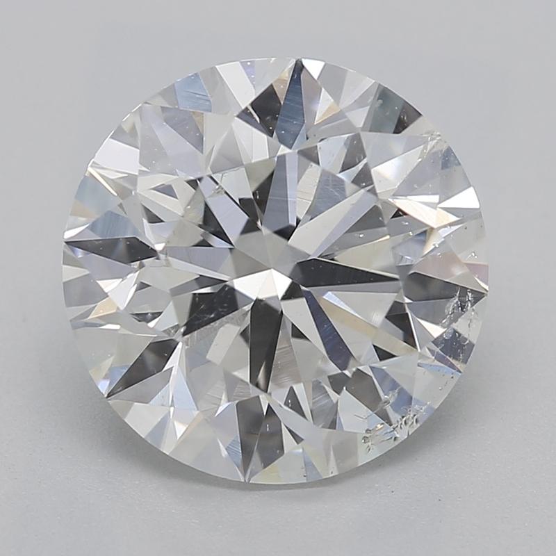 Handcrafted in New York, this exquisite diamond ring features a remarkable centerpiece of a GIA-certified round diamond weighing 2.3 and showcasing a pristine G and SI2. The elegant prong setting accentuates the diamond's exceptional brilliance and