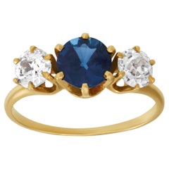 GIA 2.47 Carat Round Cut Teal Sapphire and Diamond Antique Ring