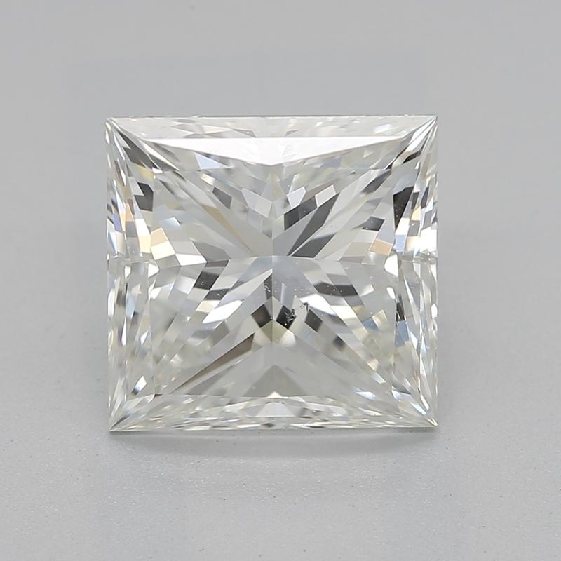 Handcrafted in New York, this exquisite diamond ring features a captivating centerpiece of a GIA-certified princess diamond weighing 2.50 , with the pristine allure of J and SI1. The modern basket four-prong v-shaped setting elevates the diamond,