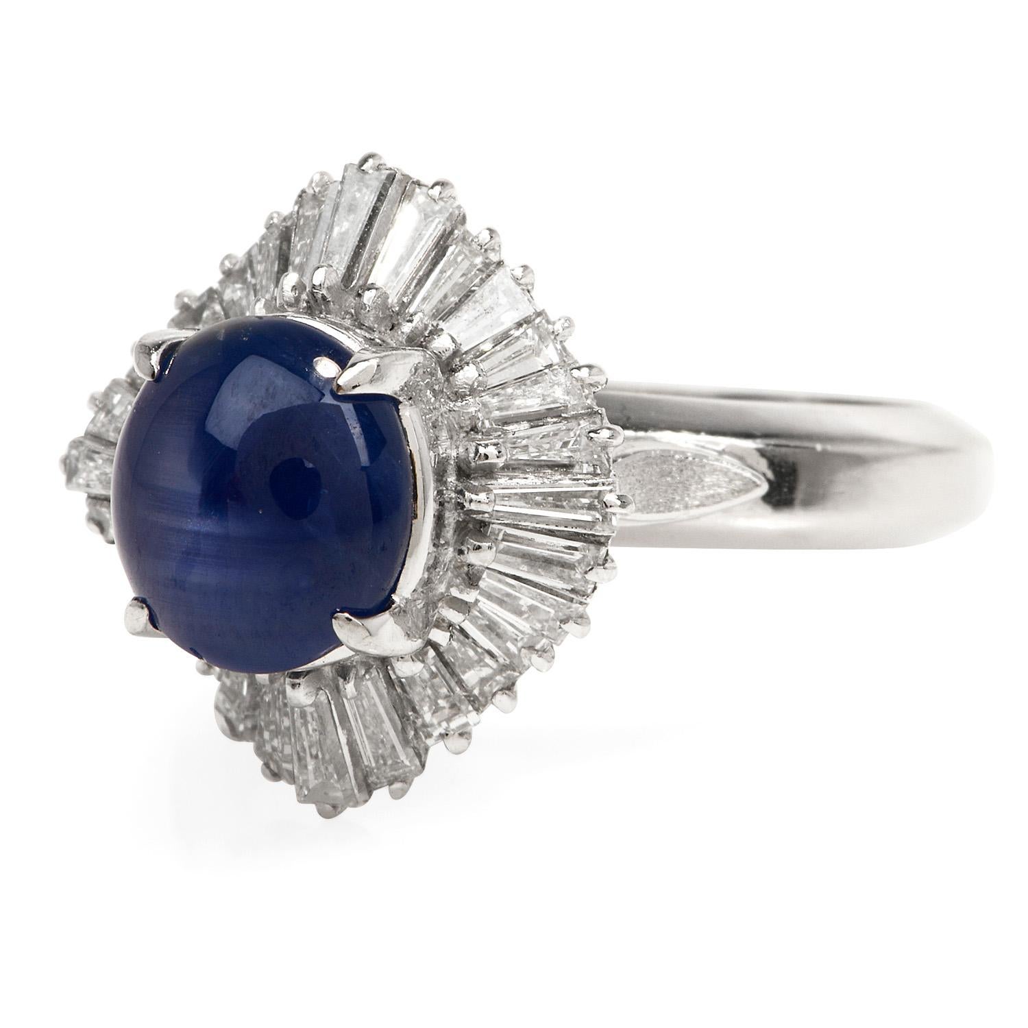 Ballerina style pinky ring, with a star asterism top display,  

Crafted in solid heavy Platinum, the center is adorned by a GIA certified Natural untreated Star Sapphire weighing approximately 2.56 carats. 

Complimenting the sides, there are (28)