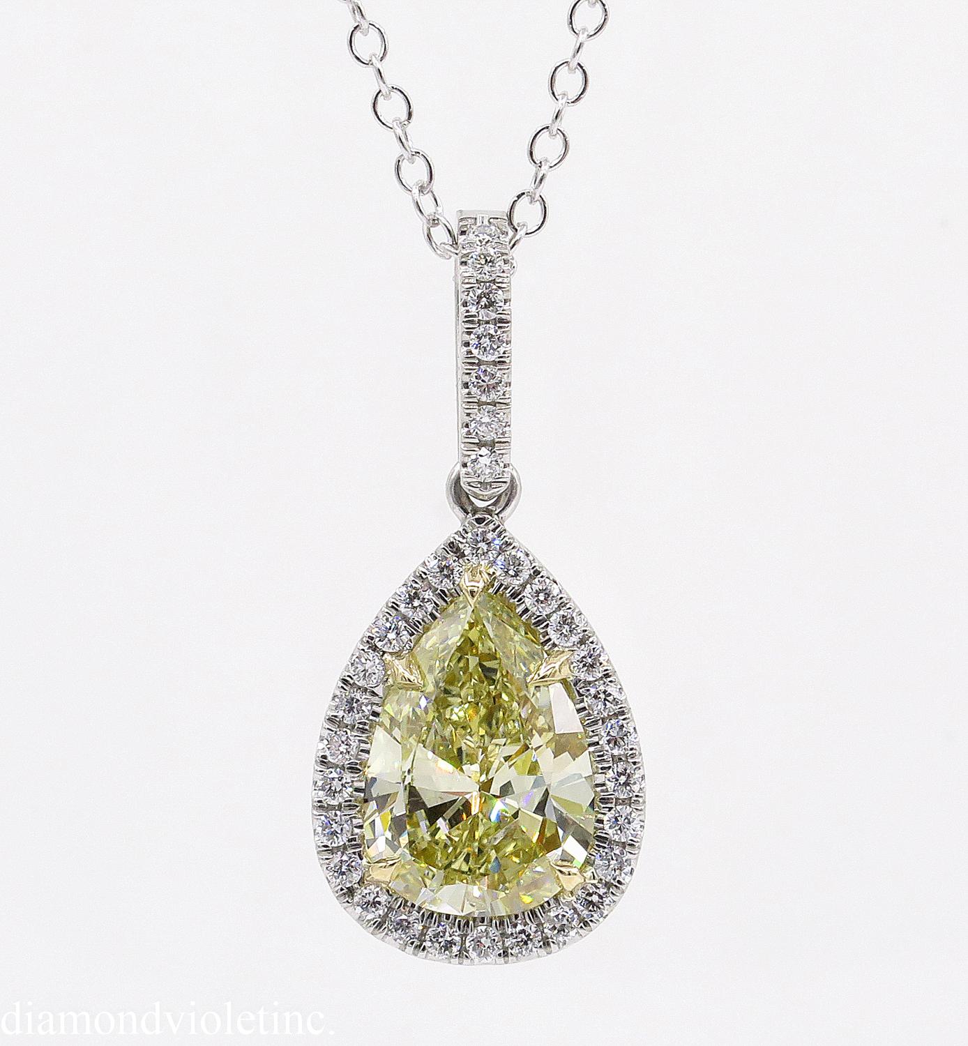 A wonderful Estate Diamond Pendant in Platinum (stamped). The center stone is GIA Certified 2.20ct Pear Shaped Diamond in NATURAL FANCY YELLOW color, SI2 clarity. Very BRILLIANT, Natural, Super Bright, EVEN color distribution and eye clear. The