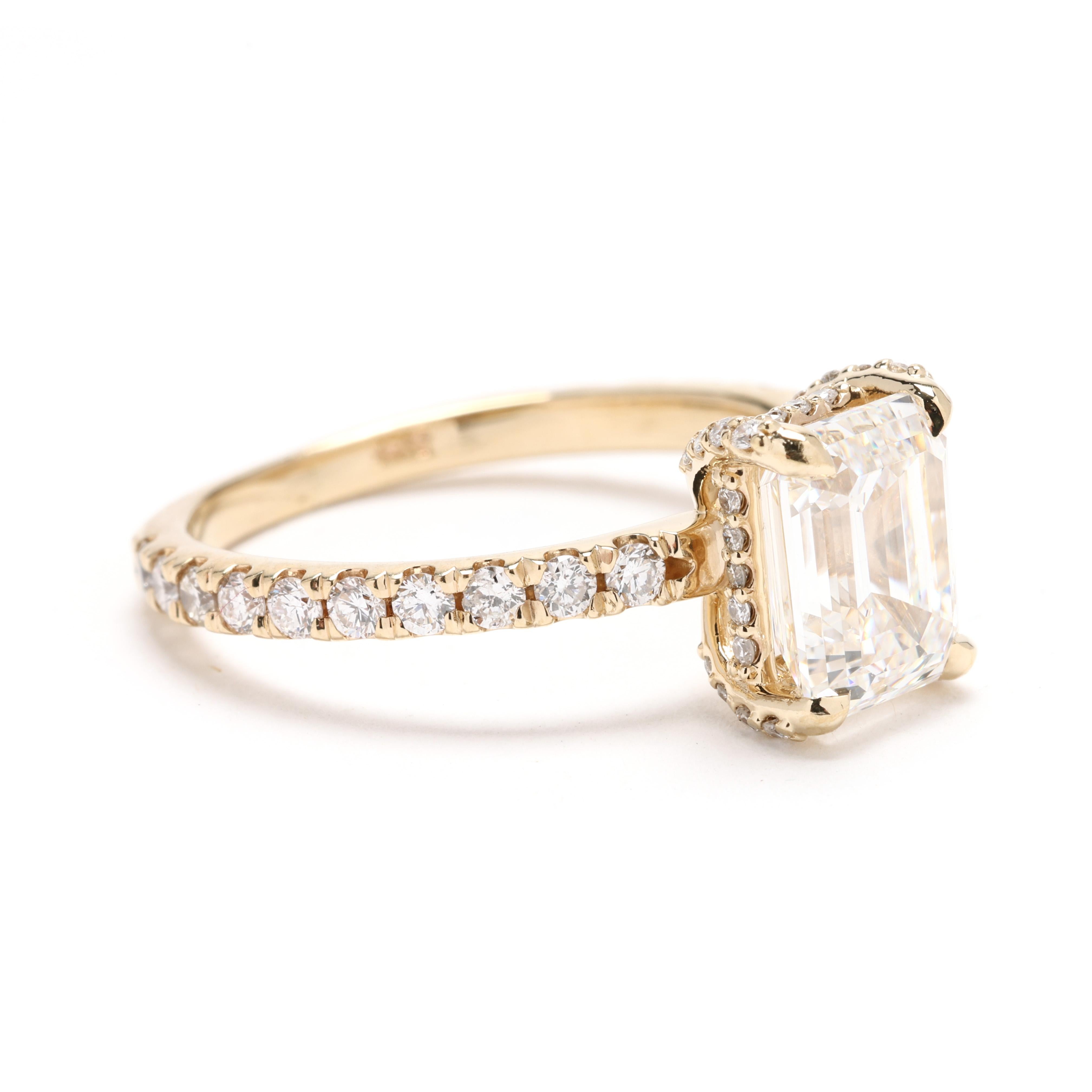 Steine:
Diamant
Smaragdschliff, 1 Stein
7.81 x 6.22 x 4.34 mm
etwa 2,01 Karat insgesamt
Farbe G/VS2 Klarheit
*GIA #16840715
runder Brillantschliff
.9 - 1.75 mm
etwa 0,55 Karat insgesamt
GH Farbe/SI1-I1 Klarheit

Ring Größe 6

Erhebung vom Finger: