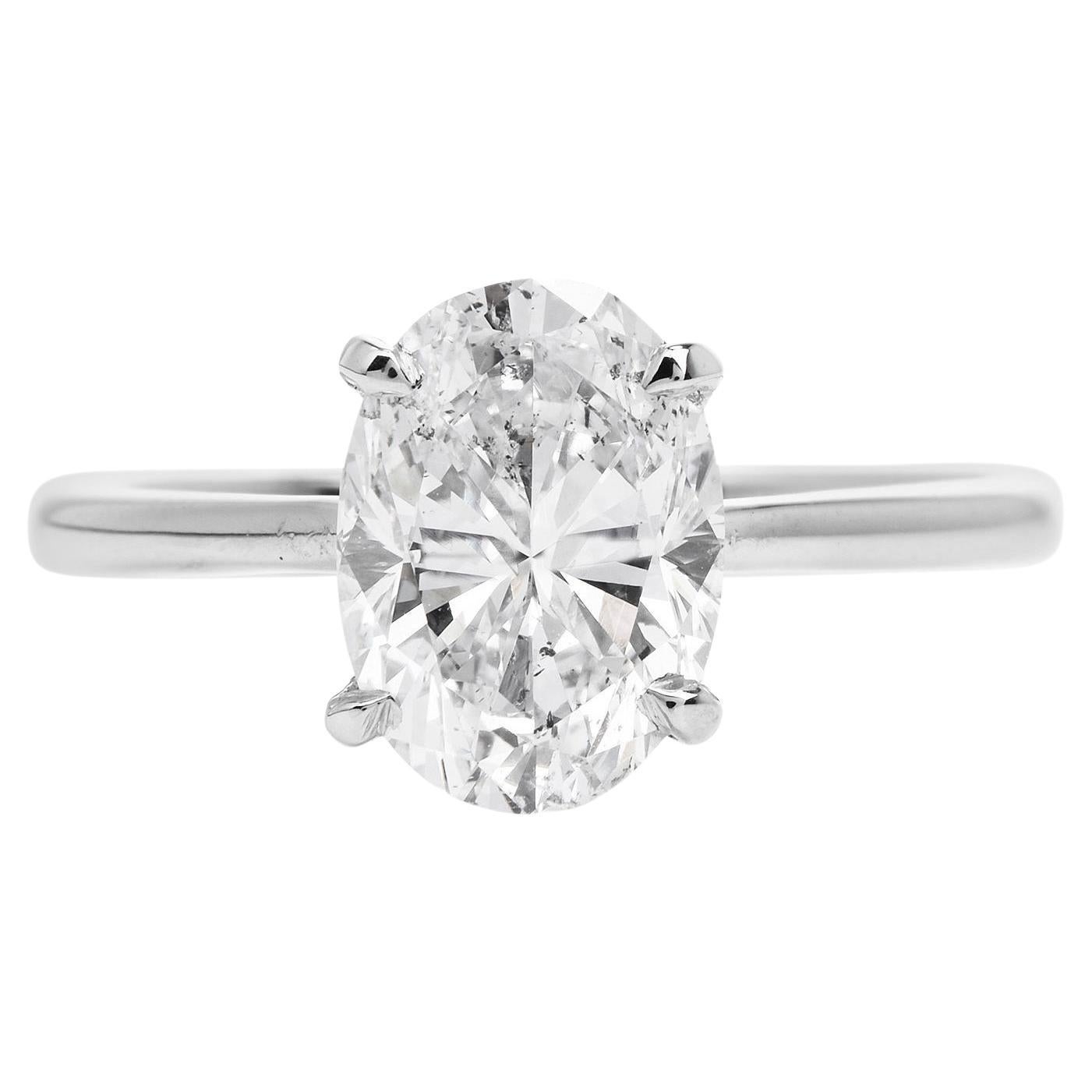 A Highly desired classic Engagement Ring!

this wide GIA-certified Diamond ring is perfect for a spectacular engagement proposal.

Crafted in solid 14K White gold, the center is adorned by an Icy With GIA Certified Oval Cut, prong-set, a genuine