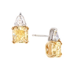 GIA 2.68 Carats Total Weight Radiant Fancy Yellow Diamond Earrings 18K and Plat