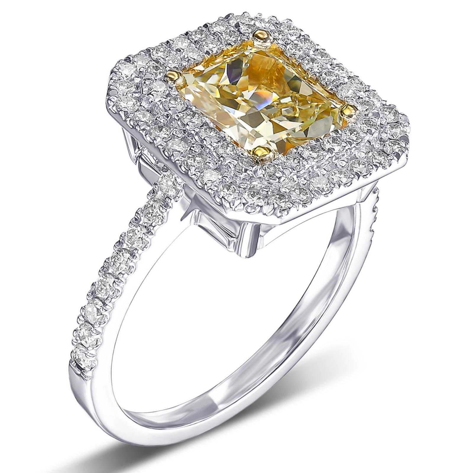 Today we are offering this amazing ring featuring a center 2.01 carat fancy light brownish greenish yellow diamond diamonds halo ring. 
A once in a lifetime opportunity to become the proud owner of this amazing ring. The ring has tremendous
