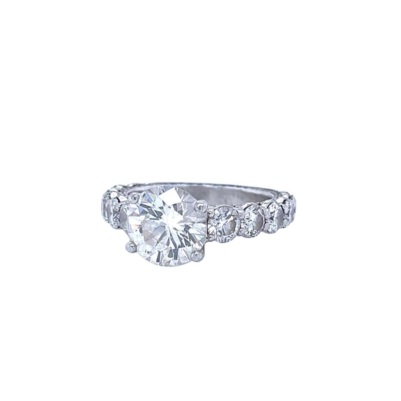 GIA 2.70ct Round Cut VS2 Clarity K Color Platinum Eternity Natural Diamond Ring In Good Condition For Sale In Aventura, FL