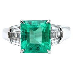 GIA 2.80 Carats Step Cut Colombian Emerald Diamond Platinum Ring