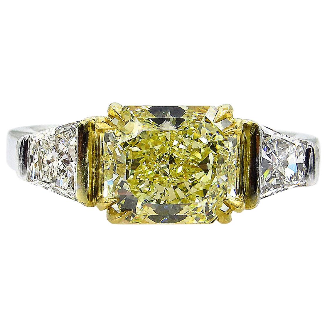 GIA 2.83 Carat Natural Fancy Yellow Radiant 3-Stone Diamond Platinum Ring