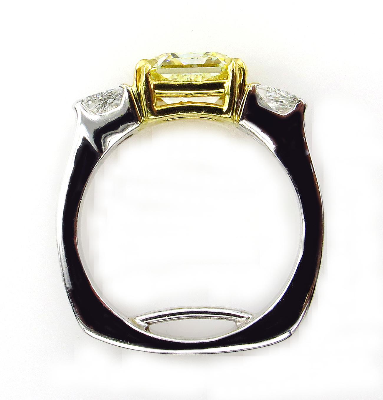 Radiant Cut GIA 2.83 Carat Natural Fancy Yellow Radiant 3-Stone Diamond Platinum Ring