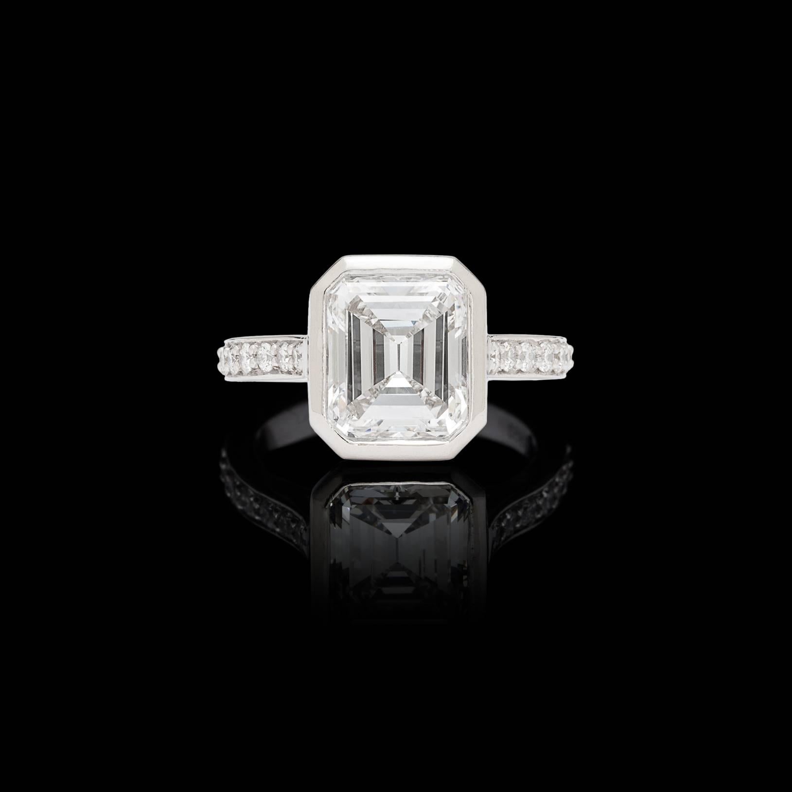 Wow! When an extraordinary diamond meets exceptional design, the result is truly mind blowing. This Platinum stunner features a phenomenal GIA graded F/VS2 Emerald Cut Diamond expertly bezel set for maximum light return. The ring is accented by 20
