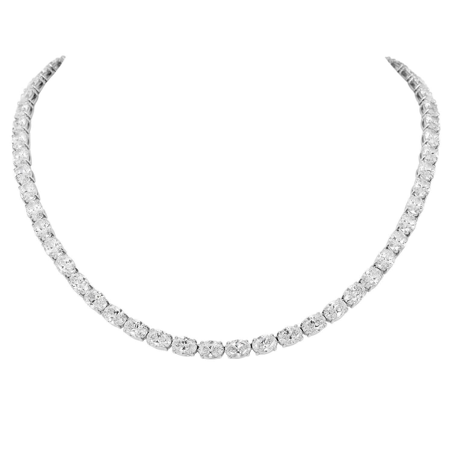 Exceptional Diamond Tennis Necklace crafted in platinum featuring brilliant oval cut diamonds.

Comprises 58 Oval Brilliant Cut diamonds with excellent cut and exceptional brilliance.

These  Collection  Natural oval Diamonds range in color from D
