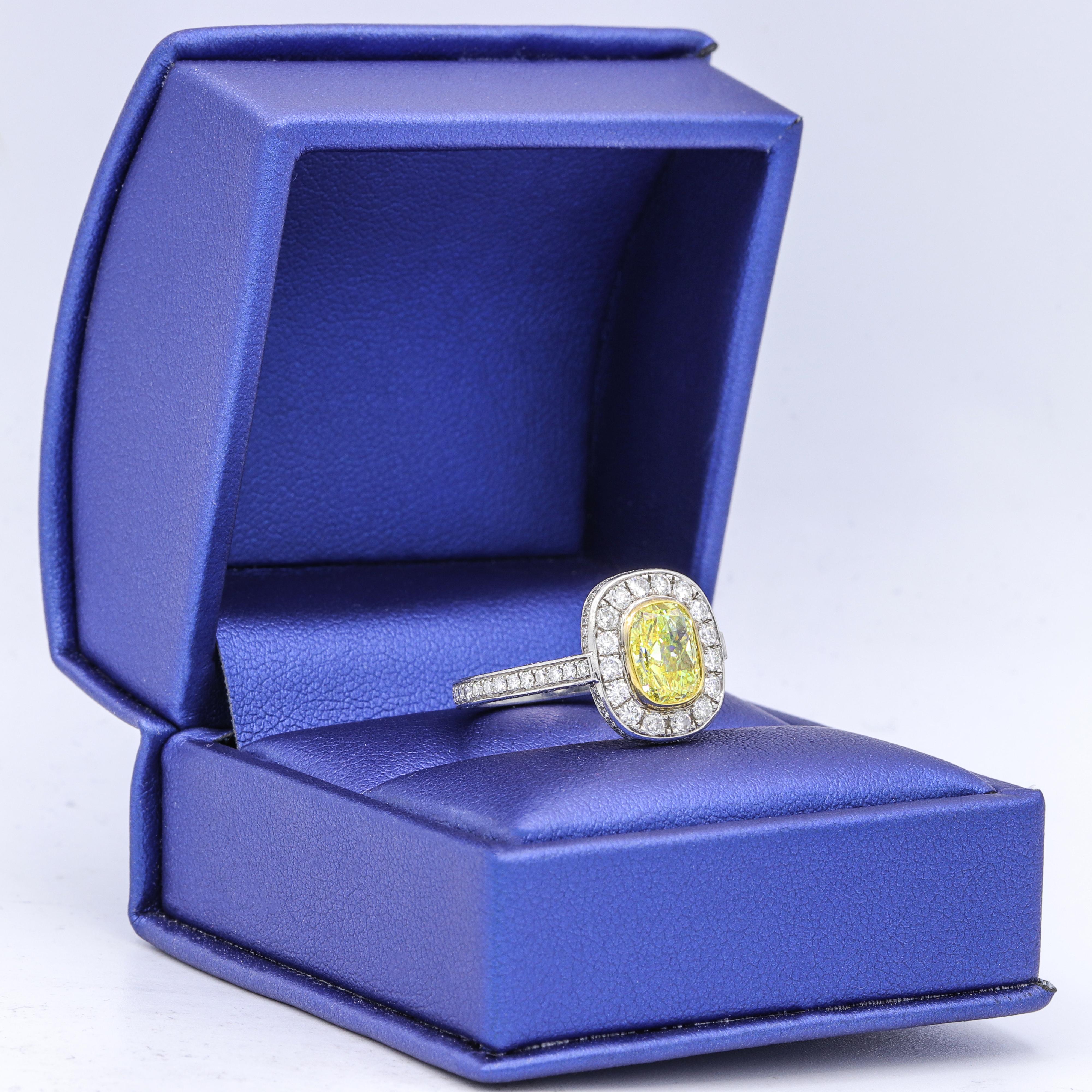 Radiant Cut GIA 2.98 Carat Fancy Intense Yellow Diamond Engagement Ring For Sale