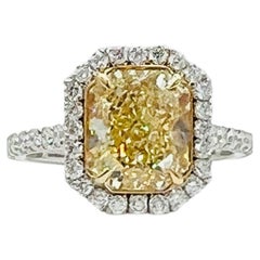 GIA 3 Carat Fancy Yellow Radiant Diamond Ring in 18K Yellow and White Gold
