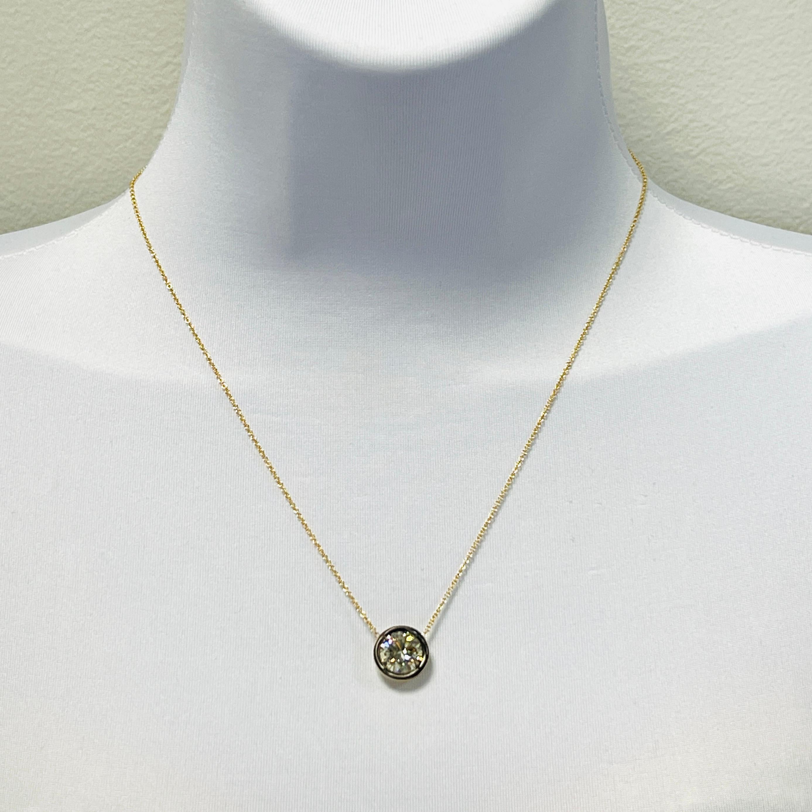 Gorgeous 3.30 ct. L VS2 white diamond round.  Handmade in 18k yellow gold and black rhodium.  Chain length is 18