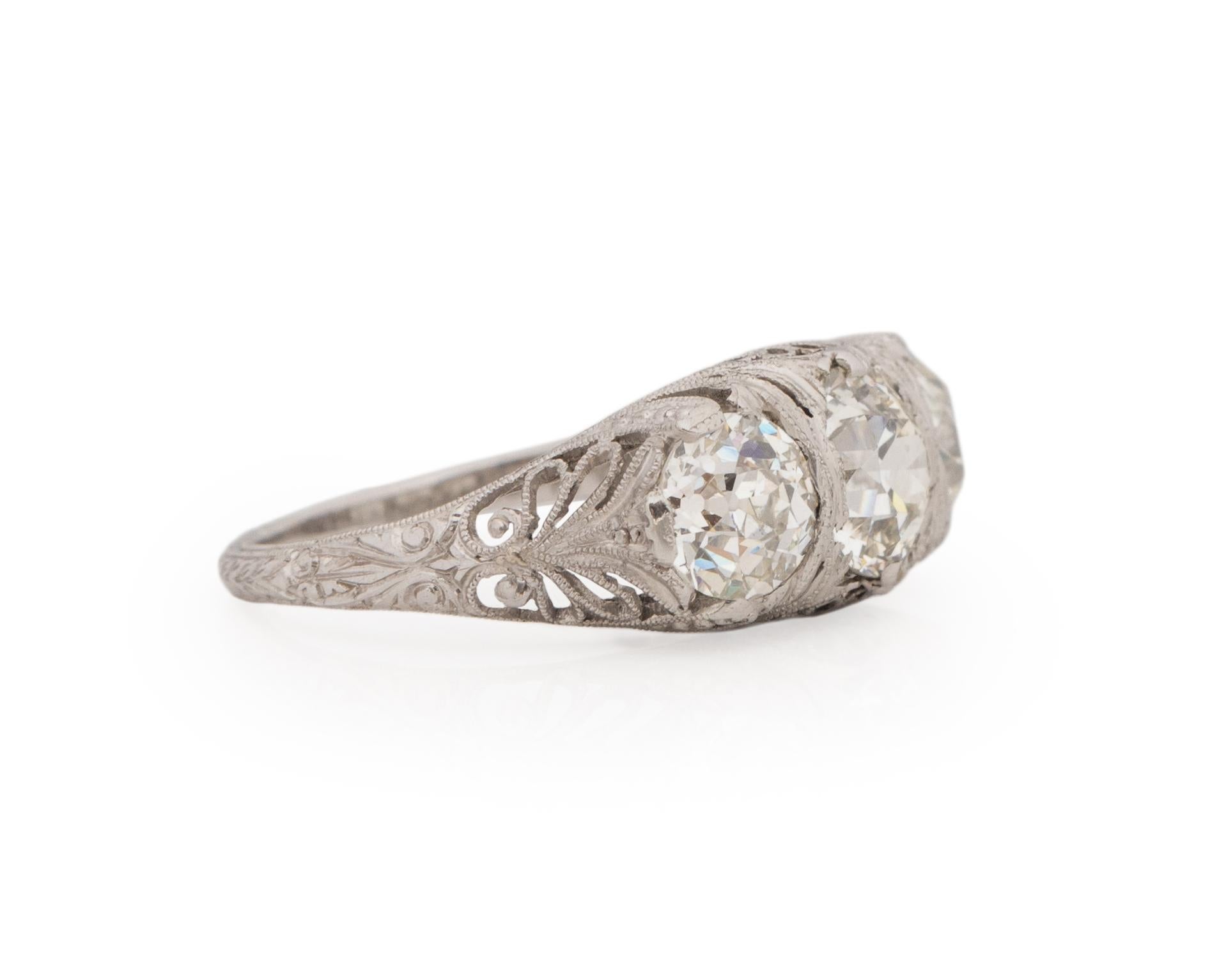 Ring Size: 6.25
Metal Type: Platinum [Hallmarked, and Tested]
Weight: 4.9 grams

Center Diamond Details:
GIA REPORT #: 6224420700
Weight: 1.40ct, total weight
Cut: Old European brilliant
Color: M
Clarity: SI1
Measurements: 7.10mm x 7.03mm x