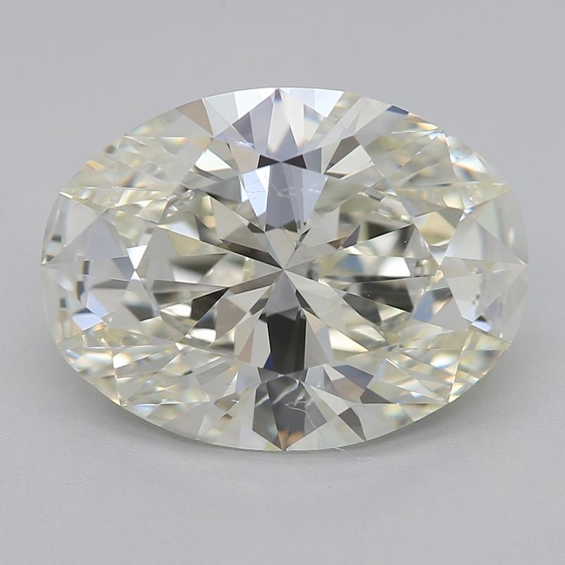 Dieser exquisite, in New York handgefertigte Diamantring hat als Herzstück einen ovalen Diamanten mit einem Gewicht von 3,01, der eine außergewöhnliche Brillanz und Klarheit ausstrahlt. Der Diamant mit den Graden J und SI1 ist GIA-zertifiziert, was