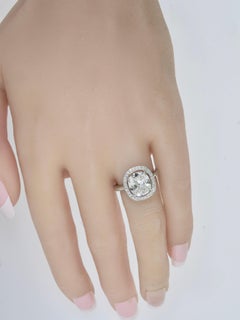 GIA 3.02 Antique Cushion Diamond G, VS1 in a Halo of Diamonds in a Platinum Ring