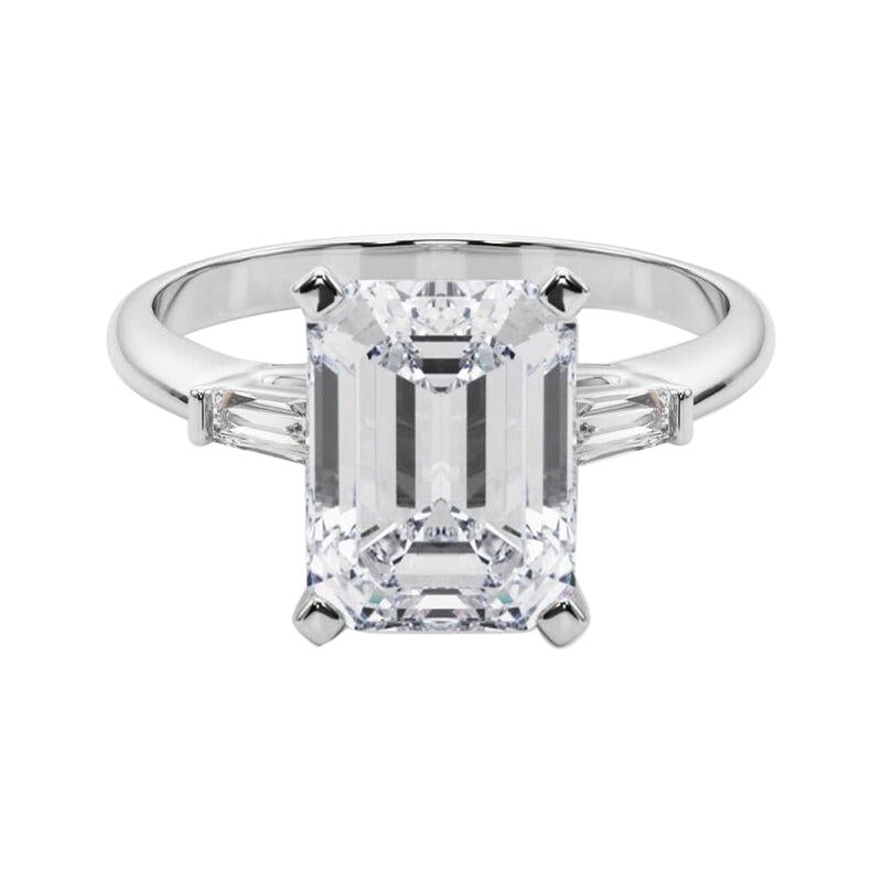 GIA 3,02ct Smeraldo a tre pietre Baguette affusolata Anello con diamanti in oro bianco 18 carati