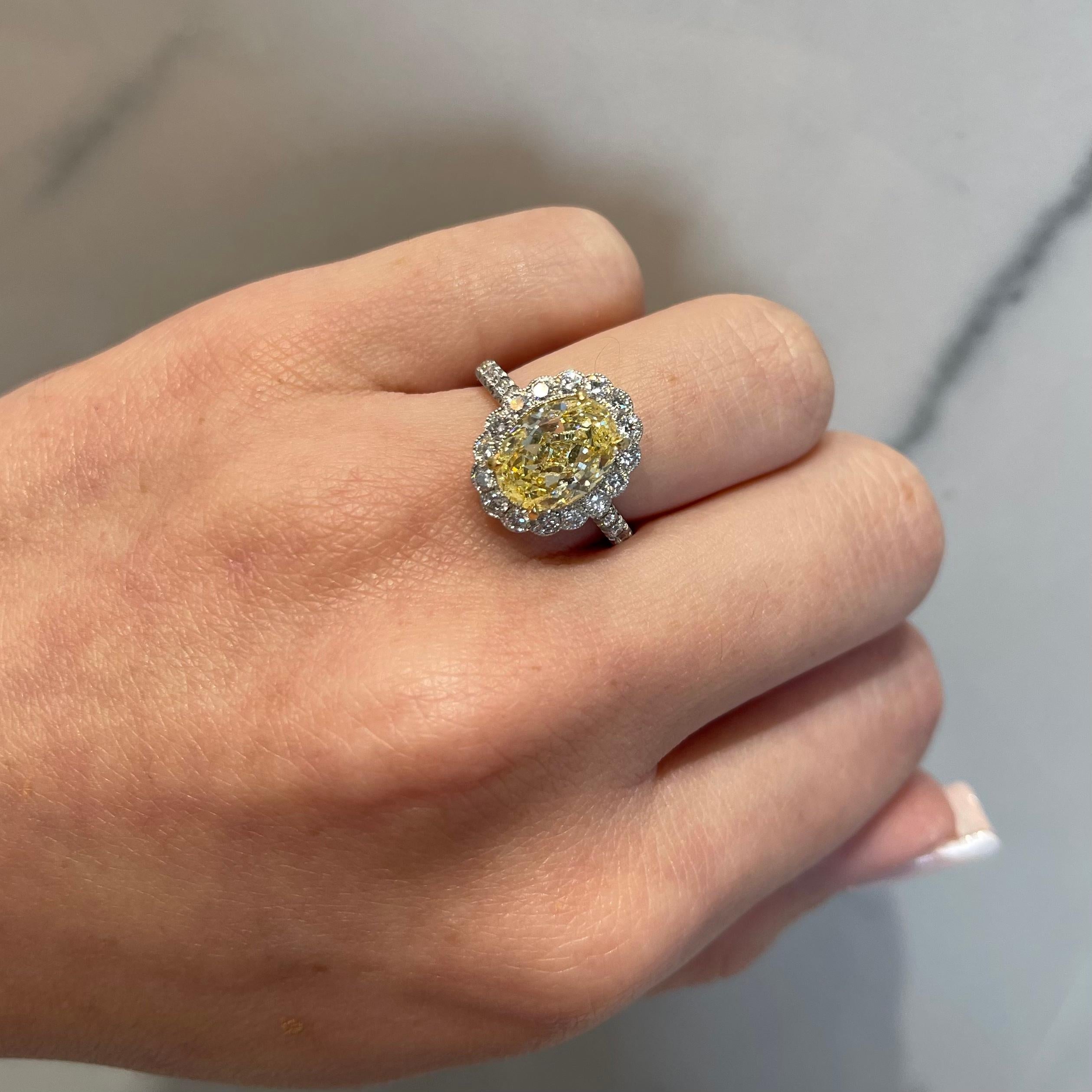 Women's GIA 3.02 Carat Fancy Yellow Oval Diamond Engagement Ring
