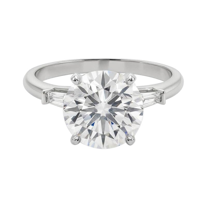 GIA Bague à diamant en or blanc 18 carats 3(three) pierres rondes Baguette effilée