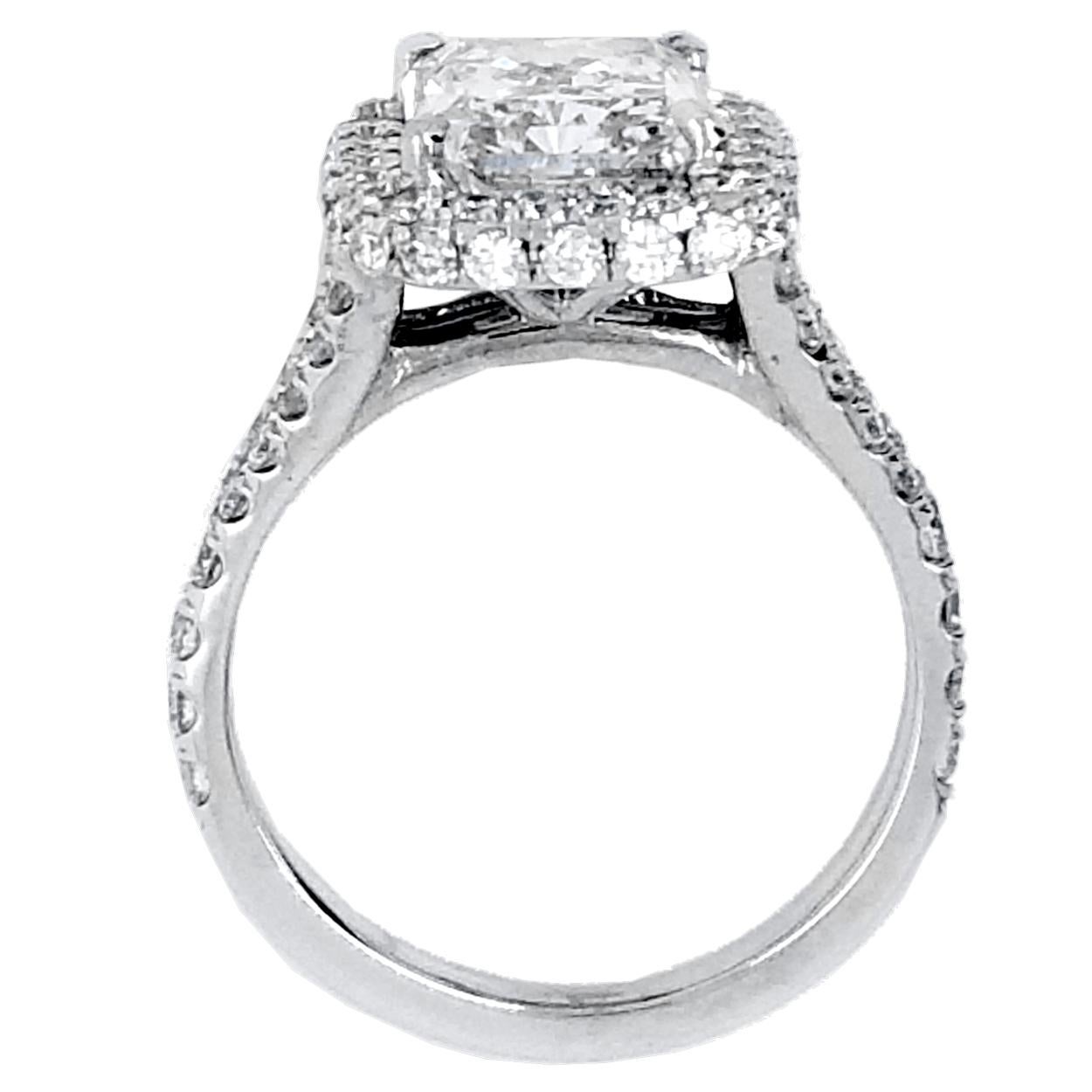 Contemporary GIA 3.04 Carat G/SI2 Radiant Diamond 18k Pave Set Split Shank Ring with Halo