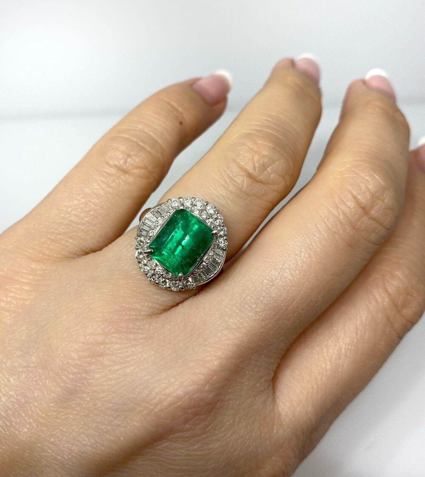 GIA Certified 3.07 carats Colombian Emerald & Diamond in Platinum

Emerald and Diamond Ring features a 3.07 carat Natural Colombian Emerald with Baguettes and Round Brilliant Diamonds set in a Platinum Ballerina setting.

The emerald is of Colombian